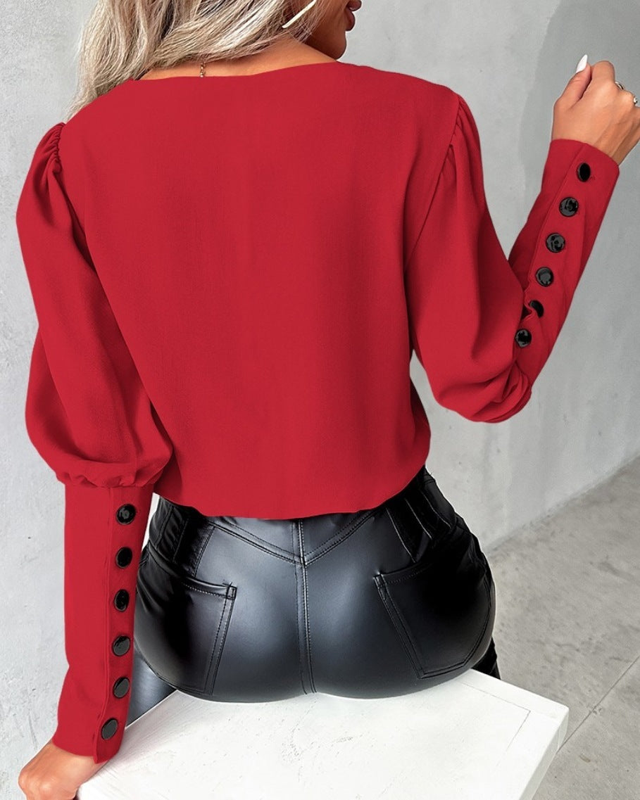 Modieuze V-hals blouse met lange mouwen en knoopdetails - PrizQ