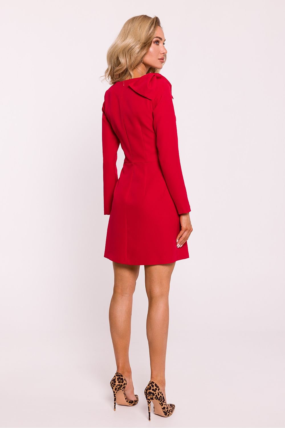 ÉclatKnot Mini jurk gedragen met hakken en clutch voor avondlook